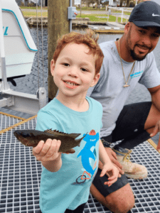 child with fish